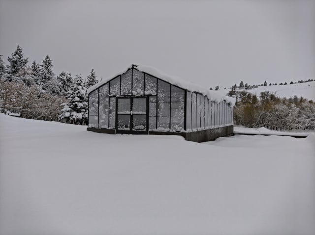BC Greenhouse in snowy winter landscape