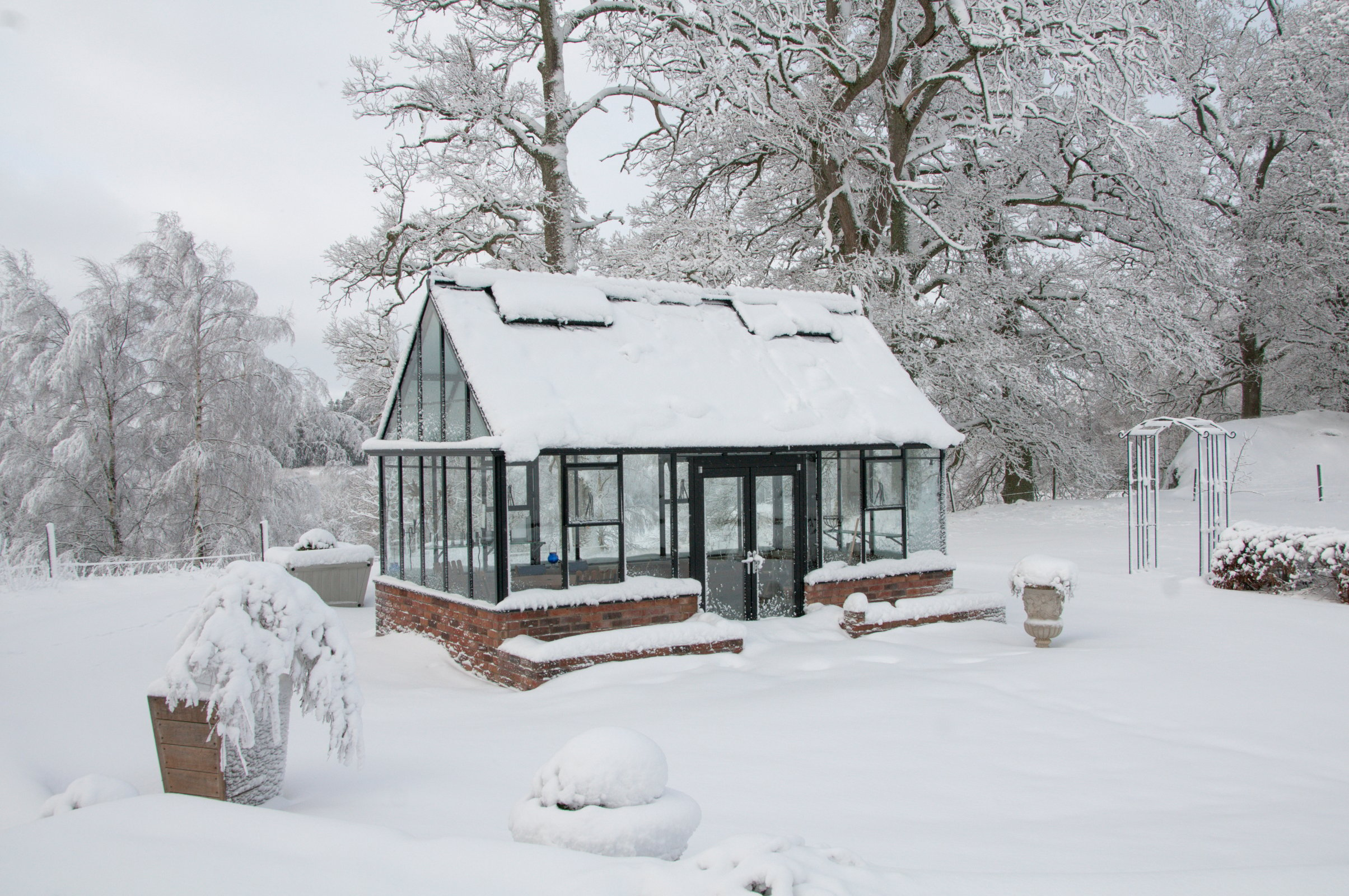 Winter Greenhouse in Snow