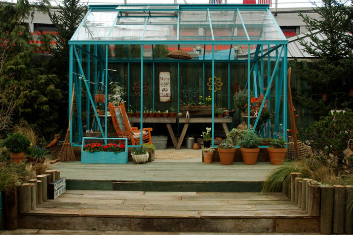 Blue painted greenhouse in Fall